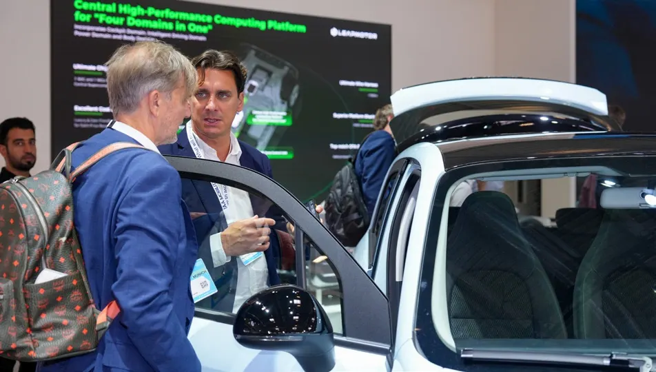 Visitors viewing a Leapmotor vehicle at the exhibition.